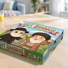 Gut Shabbos box on a family table with pawns and a die